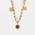 Collana in Metallo multifilo con campanella e pietre viola 3541495