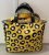 Borsa da donna gialla maculata nera e bianca modello GLAM in telone camion, Paul Meccanico.